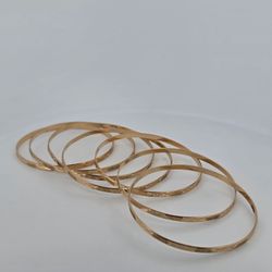 Unique Set of 7 Stackable Bangle Bracelets 14K Yellow Gold, 38.6 Grams 3.2mm