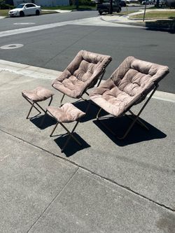Brand new two lounge chairs with foot rest for $60