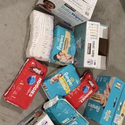 Diapers and 1 Unopened Box Of Wipes 