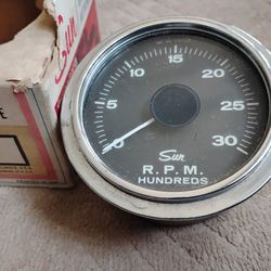 Vintage car gauges tach,amperes,oil.Cindition is  NOS or excellent.Prices vary... 