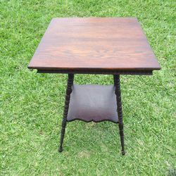 Selling a beautiful wooden corner table, 20 x 20.5 x 29 inches.