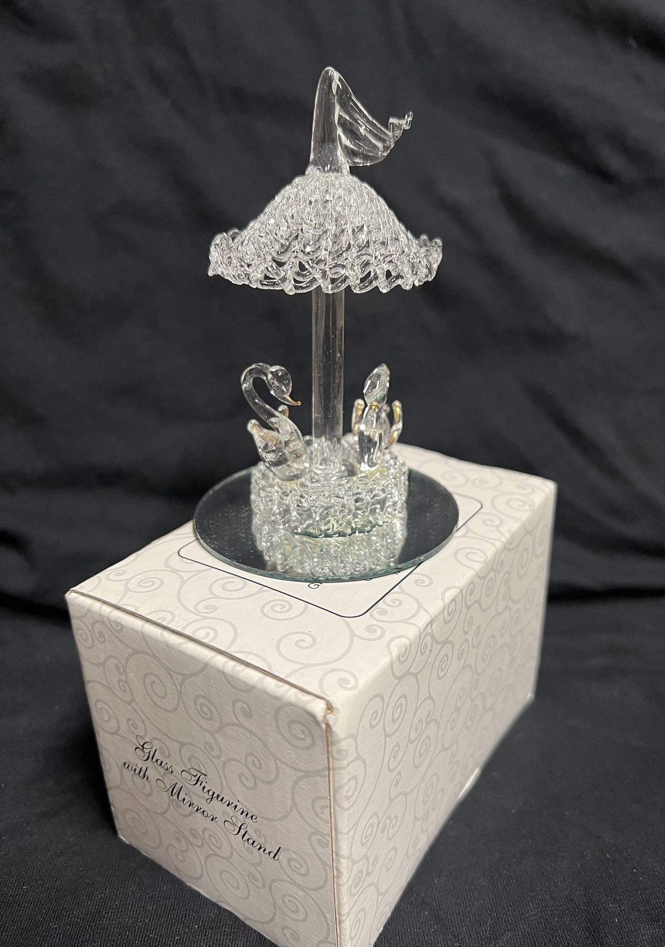 Vintage spun glass carousel with swans
