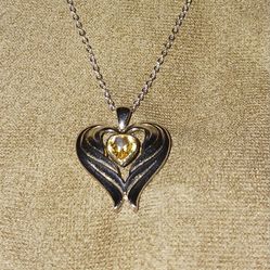 Sterling silver necklace with wing heart pendant 