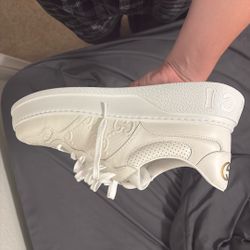 Gucci GG Embossed Leather Low-Top Sneakers