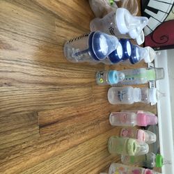 Assorted Baby Bottles And Parts
