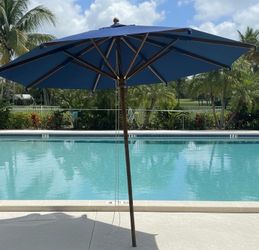 Dany Brendola - (Vicenza) Italian Teak Wood Framed Patio Umbrella with Storage Bag! Great condition! Diameter 120in Height 102in Retails over $2,000
