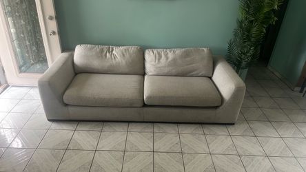 light gray 3- seat sofa