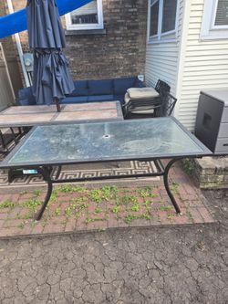 Patio table with tempered glass top