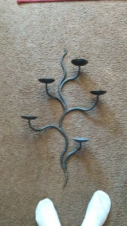 Cast iron candle holder