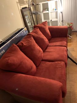 Red sofa with love seat