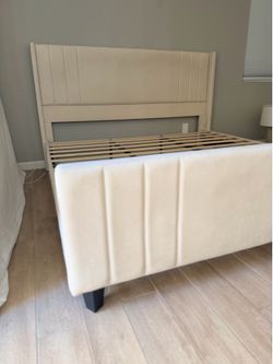 Cream upholstered king platform bed frame