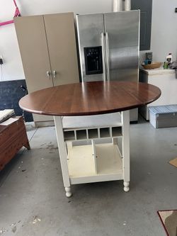 Extendable Round Dining Table