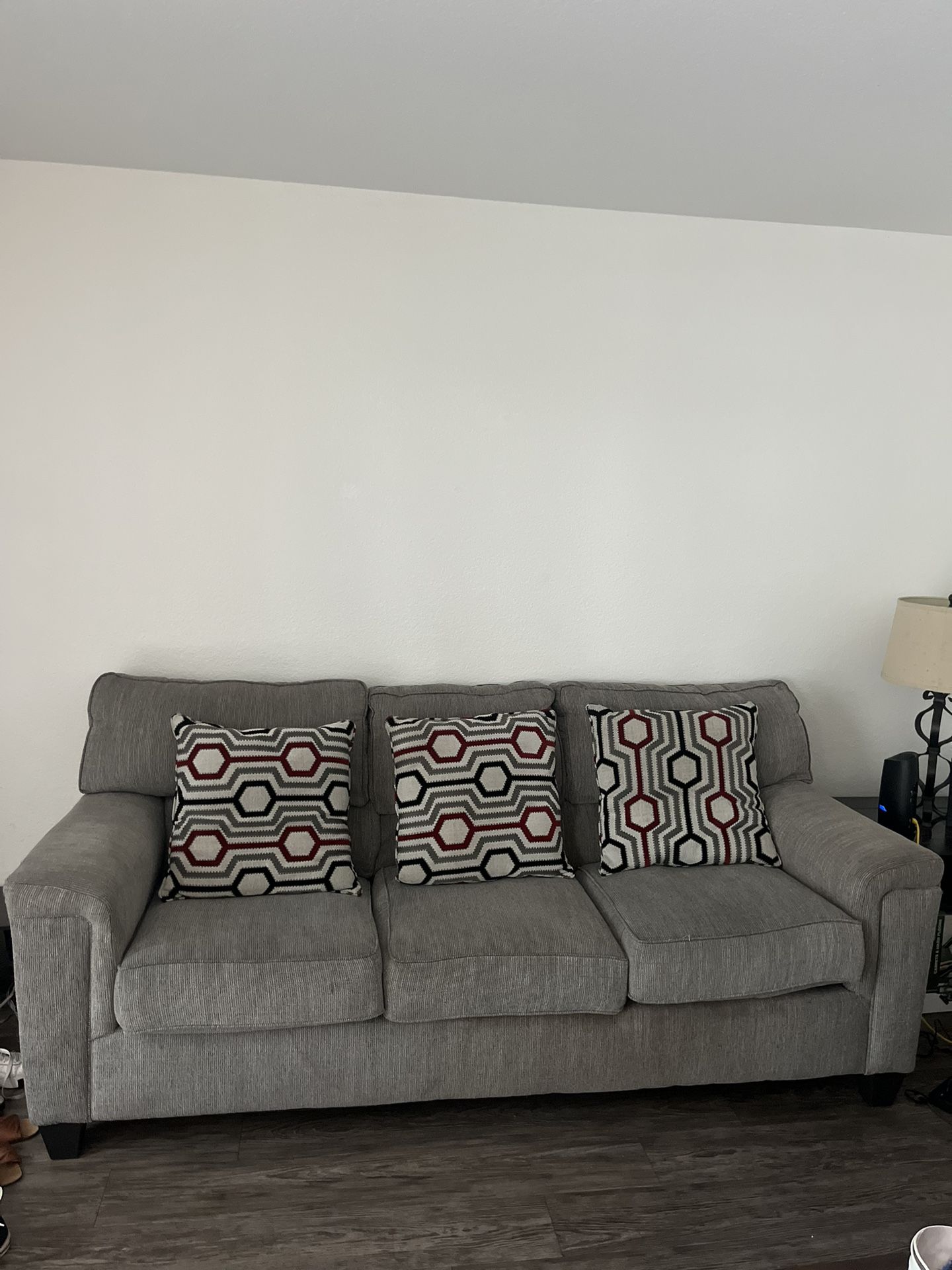 Two Gray Couches / Sofas with 4 Pillows 