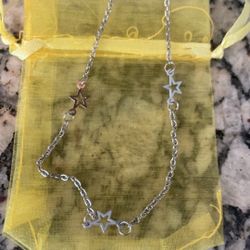 NWOT silver star anklet/bracelet