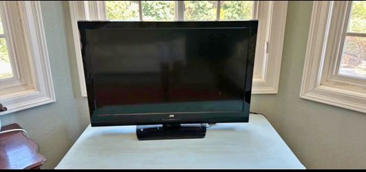JVC Flat Screen TV with Stand