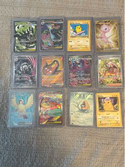 Lot of 12 Pokemon cards.