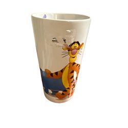 Disney 6” coffee mug of Winnie the Pooh it has a small hairline crack inside cup but not on outside no refunds. T-42