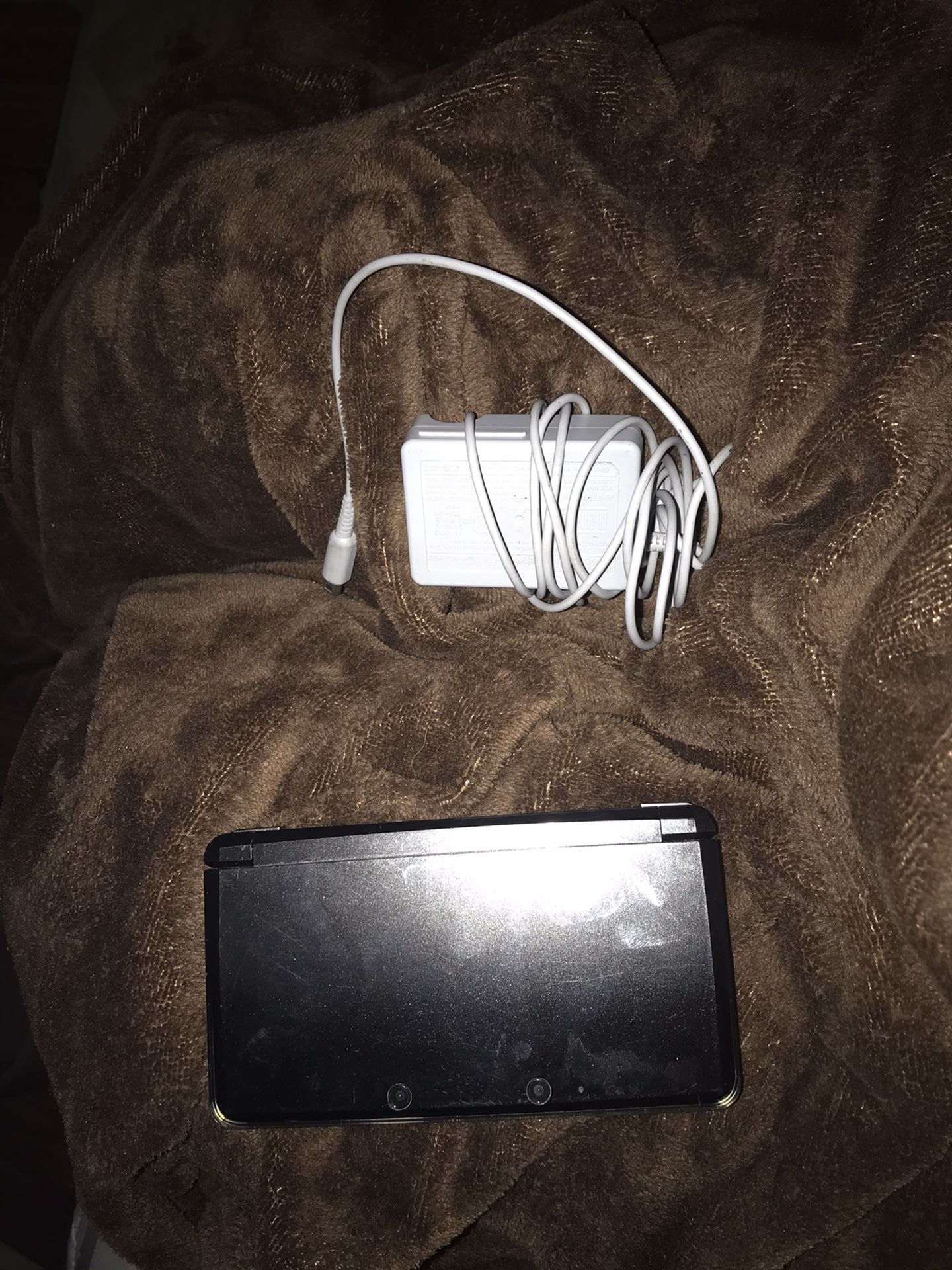 Nintendo 3ds with charger