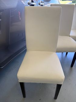 Cream Upholstered Dining Chairs with Dark Legs