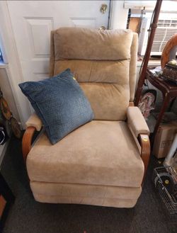 Nice comfy chair. Swivels, recliner.