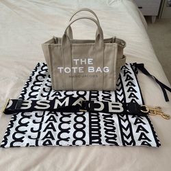 Small beige Marc Jacob’s tote bag with strap.