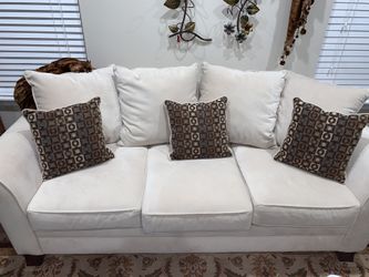 Pair of white couches