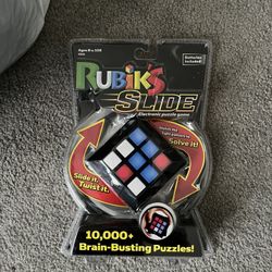 NEW Rubik’s Slide Electronic Game 10,000 + Brain Busting Puzzles - Slide it Twist