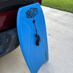 Boogie Boards And Inflatable Boat