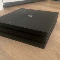 PS4 Pro With a Portable SSD P500 ( Extra Space To Play) and One Controller 