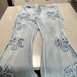 Women’s jeans with flower appliqué