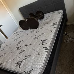 Queen Size Mattress With A Bed Frame And 2 Corner Tables 