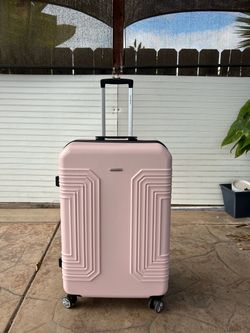 Pink SamsOnite Luggage Hardshell