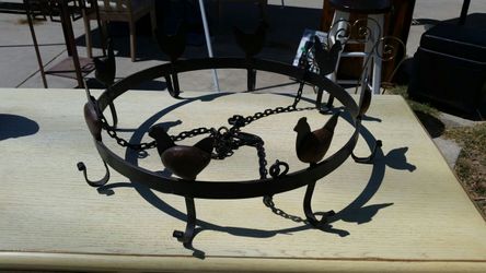 Metal pot holder with chickens around top