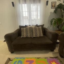 Brown Recessed Armchair Sofa With Accent Pillows