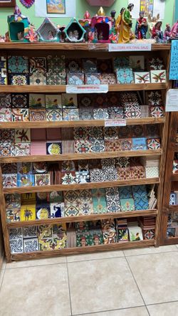 Talavera tiles  ( price vary depending on the size and design )