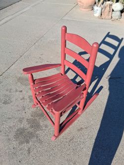 Country red rocking chair.