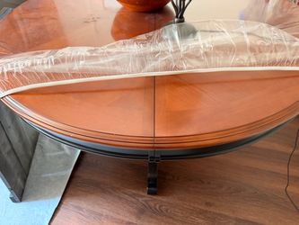 Round Wood Dining Table (hidden leaf) with Black Base and 4 Chairs