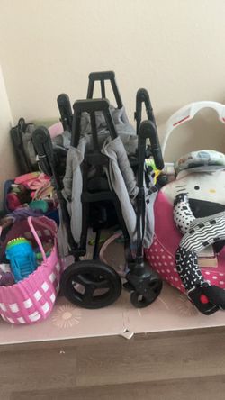 Folded Jeep wrangler wagon, momcozy hip carrier & formula