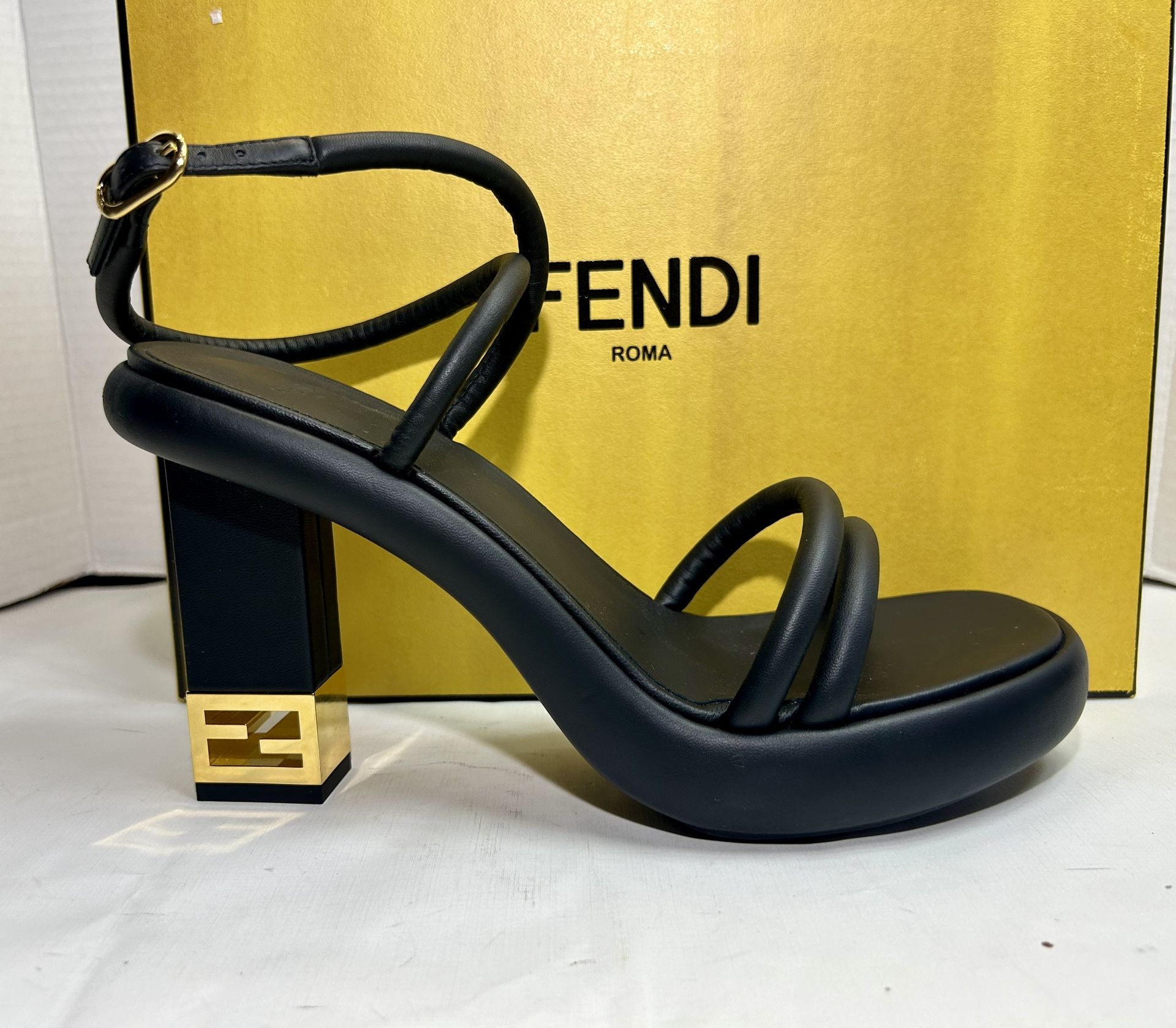 NEW FENDI BAGUETTE STRAPPY SANDAL BLACK LEATHER GOLD METAL FF LOGO HEEL SZ 37.5 