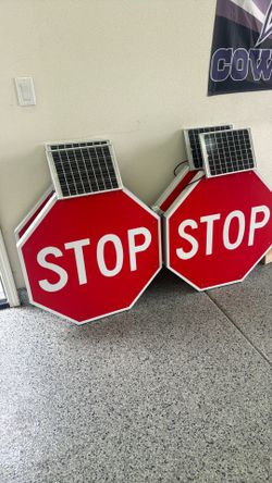 Stop signs with flashing lights