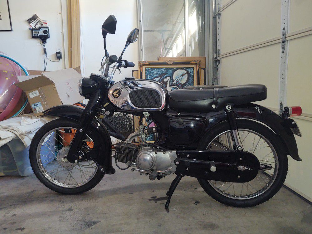 Honda 90 1965 motorcycle in pristine condition. I'm selling for $1750 0.B.O