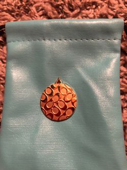 Coach necklace pendant
