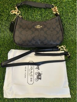 Black and brown Coach shoulder bag with conversion straps