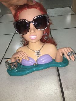 everything for $15 dollar the earings,ring ,neklace , bracelets and glasses not doll included