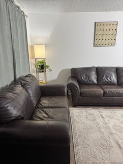 Ashley Furniture Brown Leather Sofa & Loveseat Set