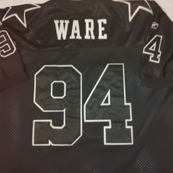 Vintage Reebok NFL Dallas Cowboys DeMarcus Ware #94 Jersey in size 56 is an authentic piece of fan apparel for football enthusiasts. Officially licens