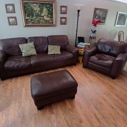 Leather sofa, ottoman and chair for sale.