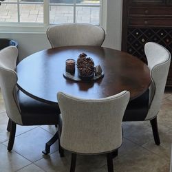 Large dining room table with chairs