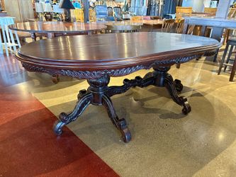 Mahogany Dining Table with Intricate Carved Trestle Base