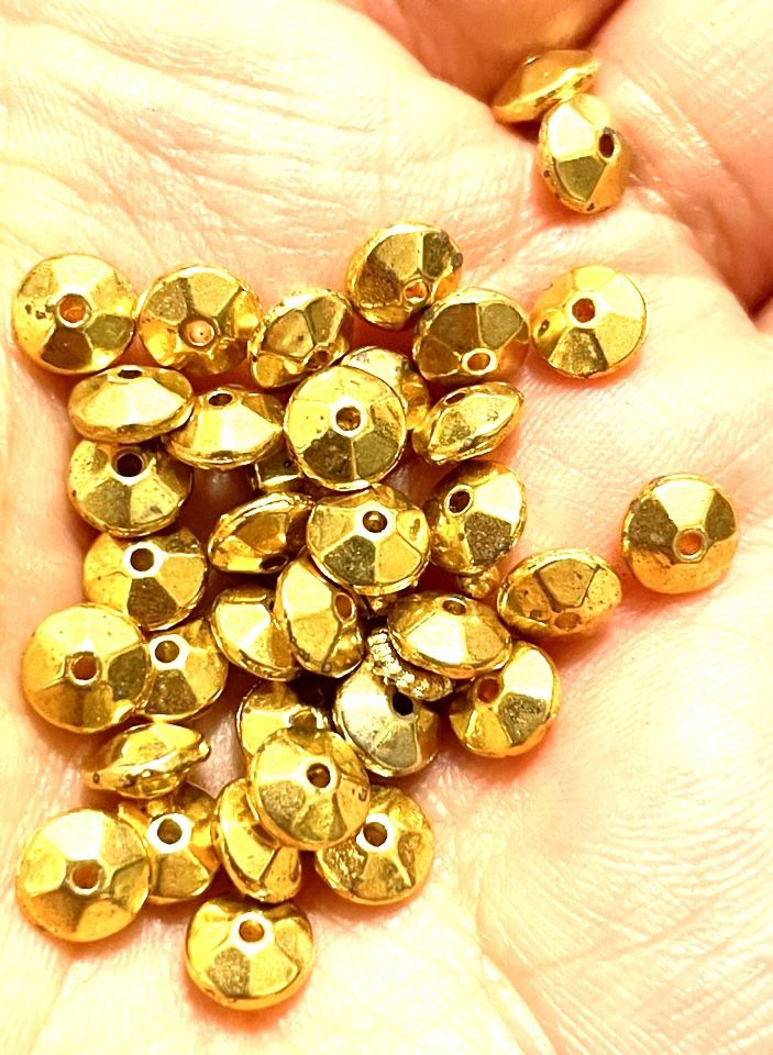 Over 100 Brass Saucer Beads